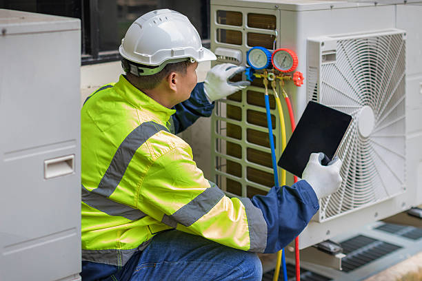 Professional Ac Installation technician working in Holmesville, OH